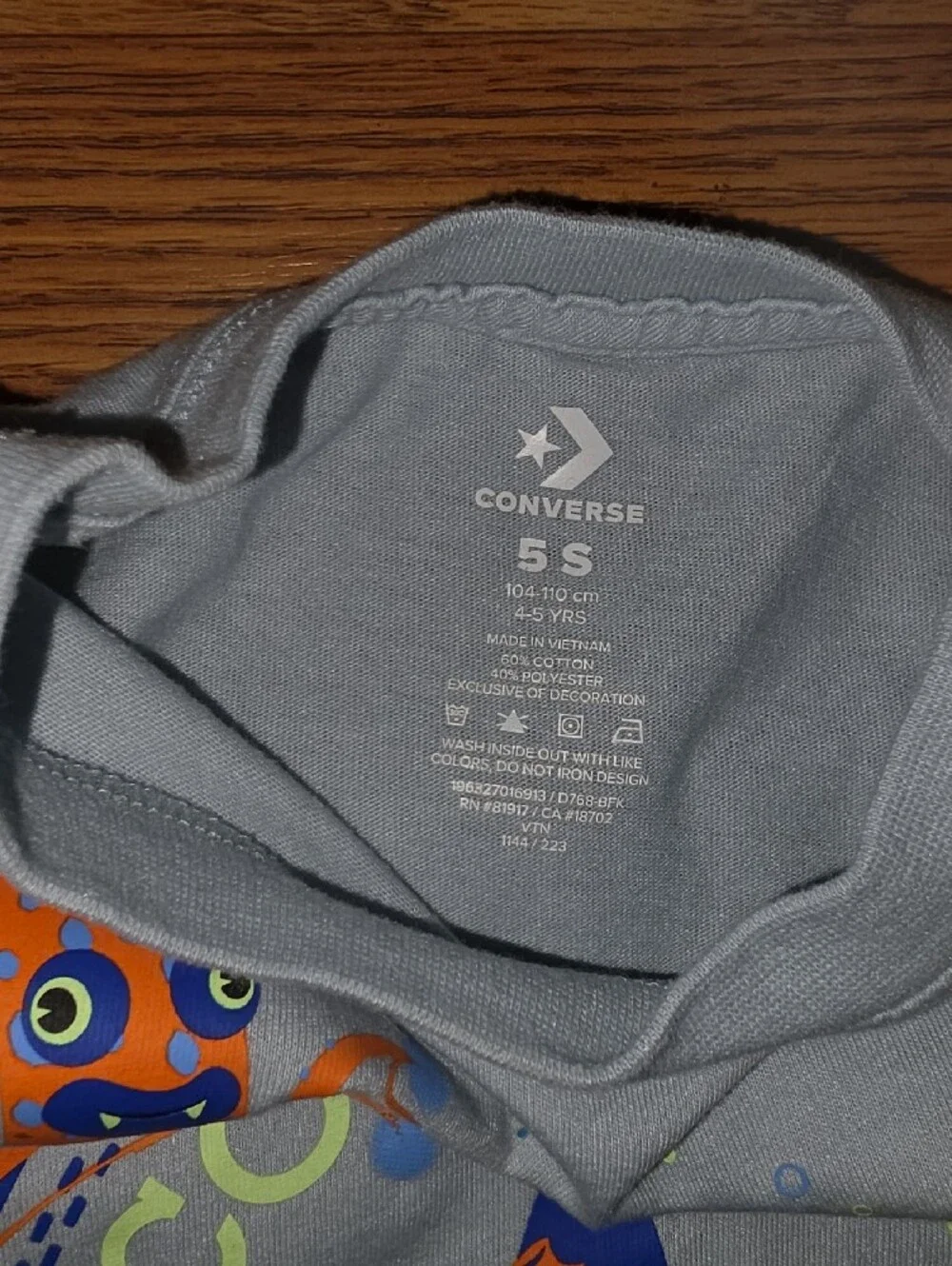 Converse Light Blue Tee with Navy and Orange Graphic